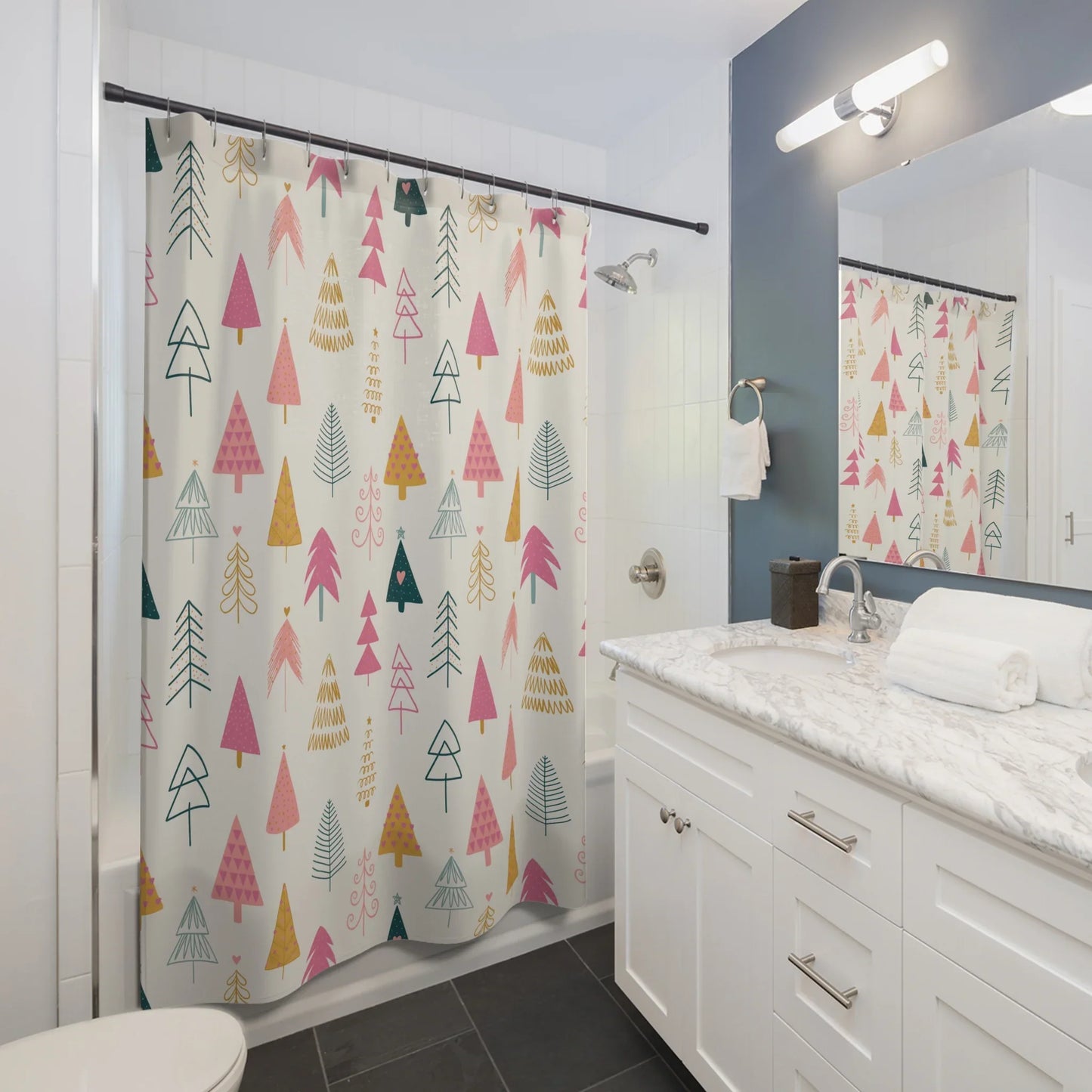 Bathroom with a colorful shower curtain featuring geometric tree patterns.