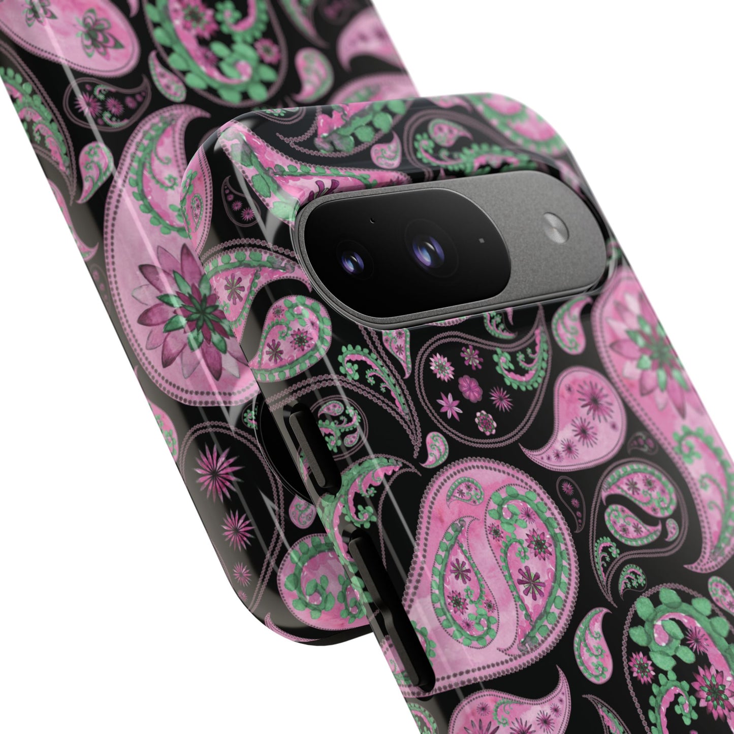 Phone case with pink and green paisley pattern on a black background