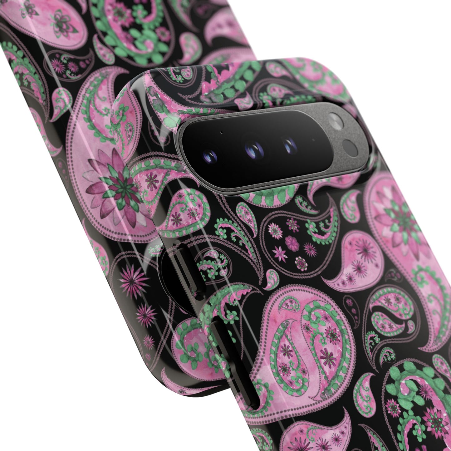 Phone case with pink and green paisley pattern on a black background