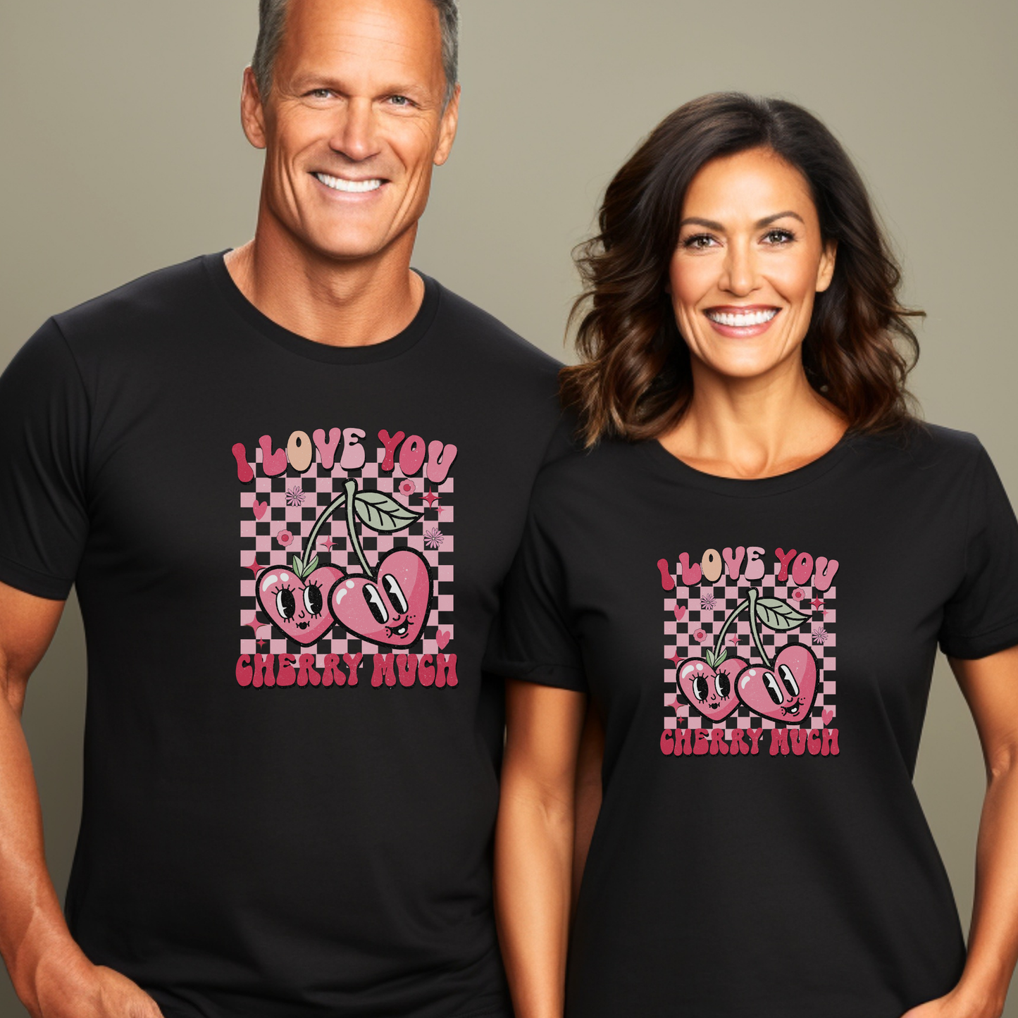 Man and woman wearing black t-shirts with a cherry graphic and text. i love you cherry much