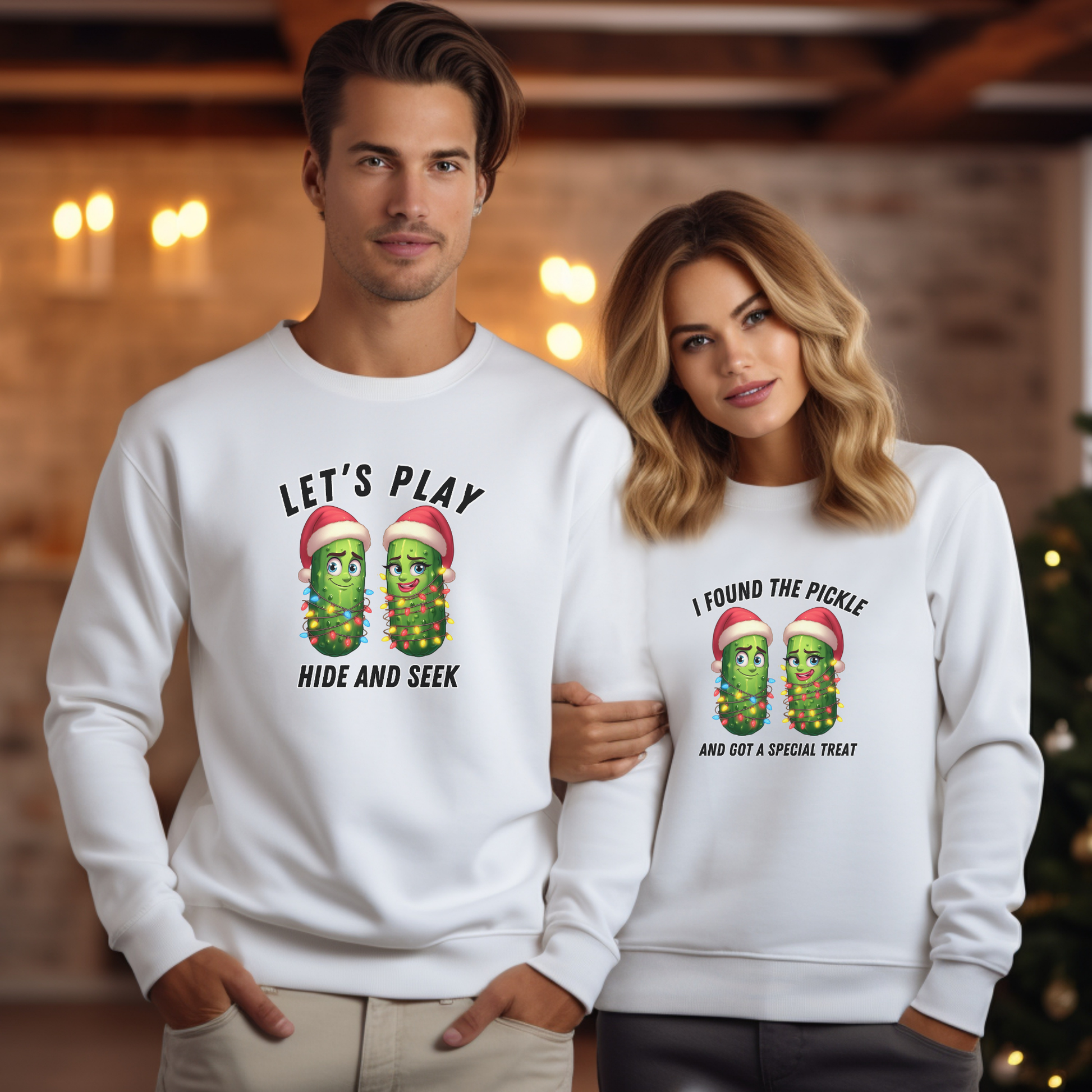 Two people wearing white sweatshirts with pickle-themed designs in a festive setting.