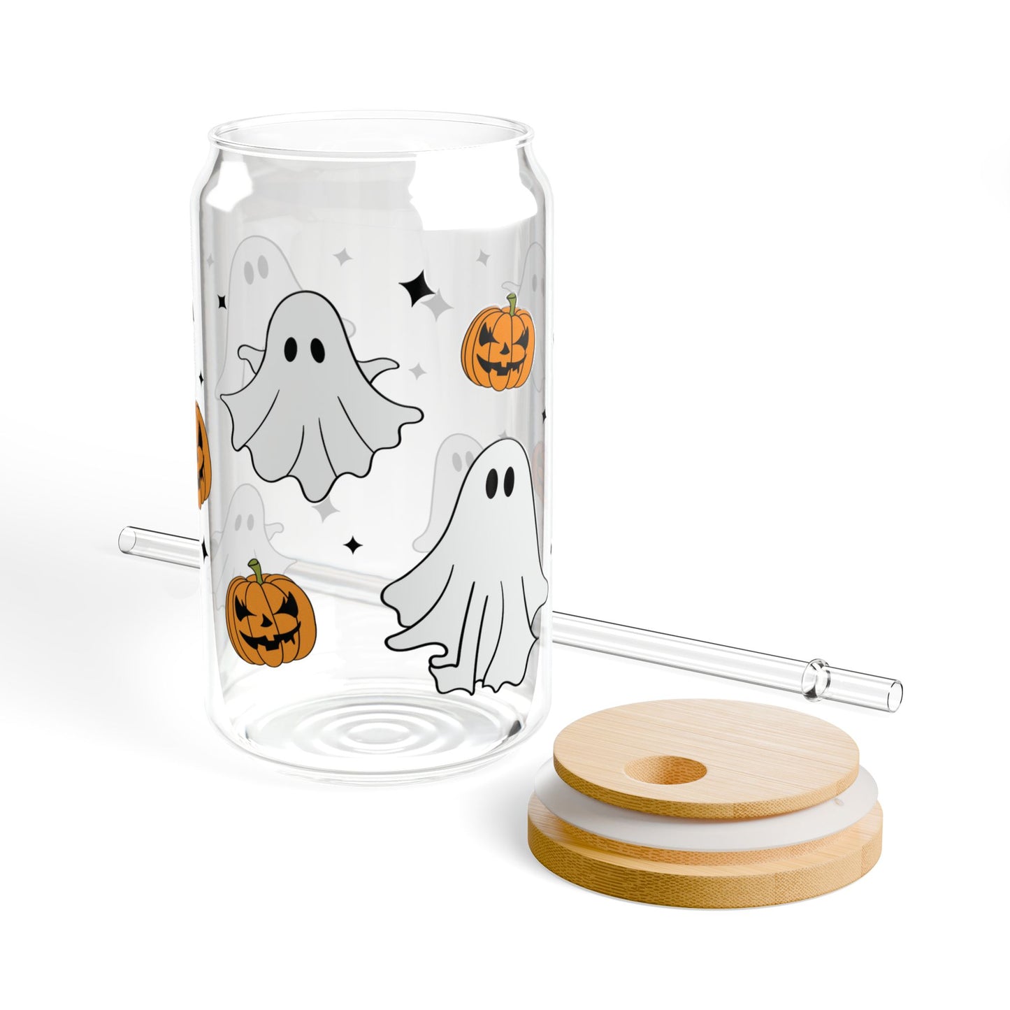 Halloween-themed glass with ghosts and pumpkins, including a straw and two coasters on a white background