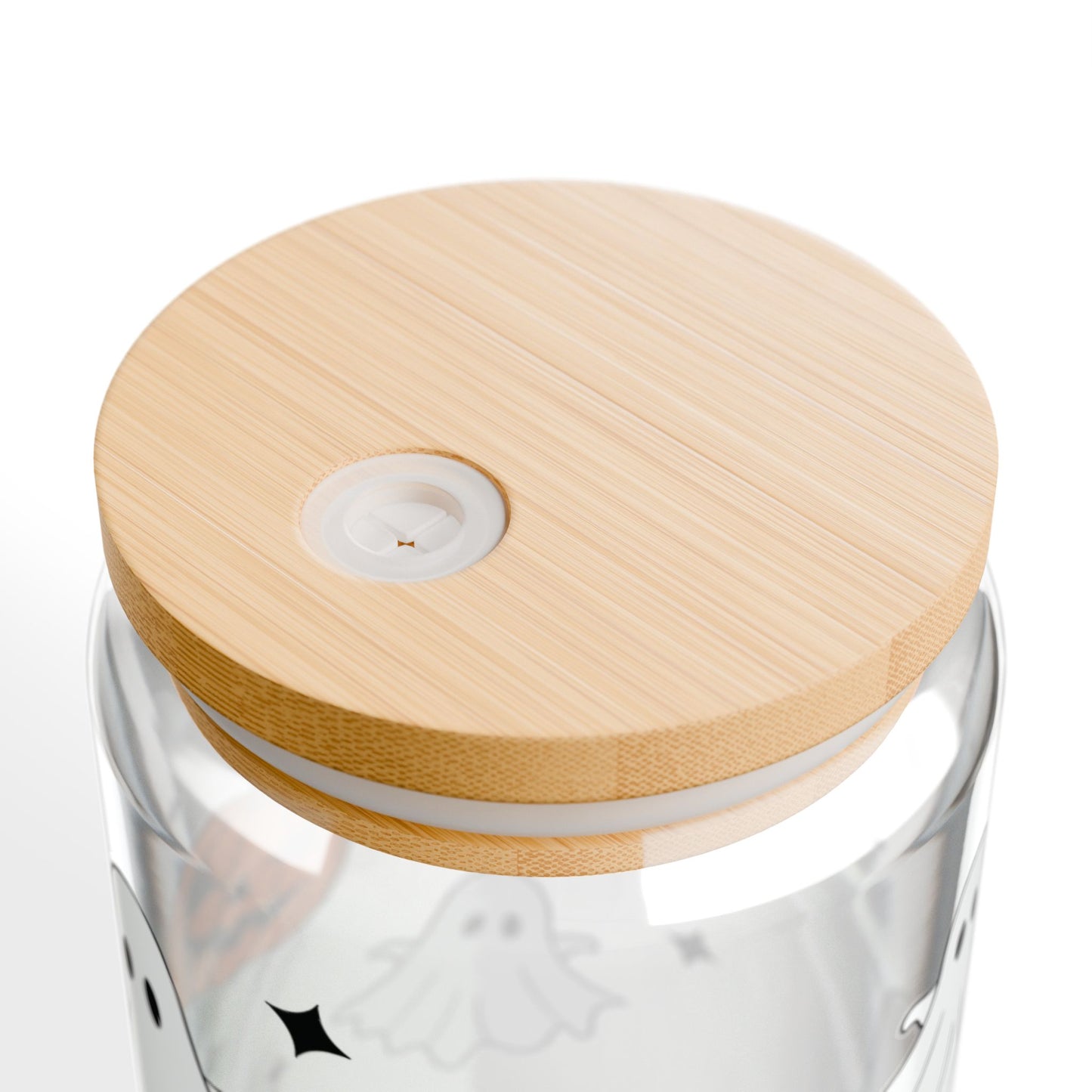 Glass container with a wooden lid on a white background
