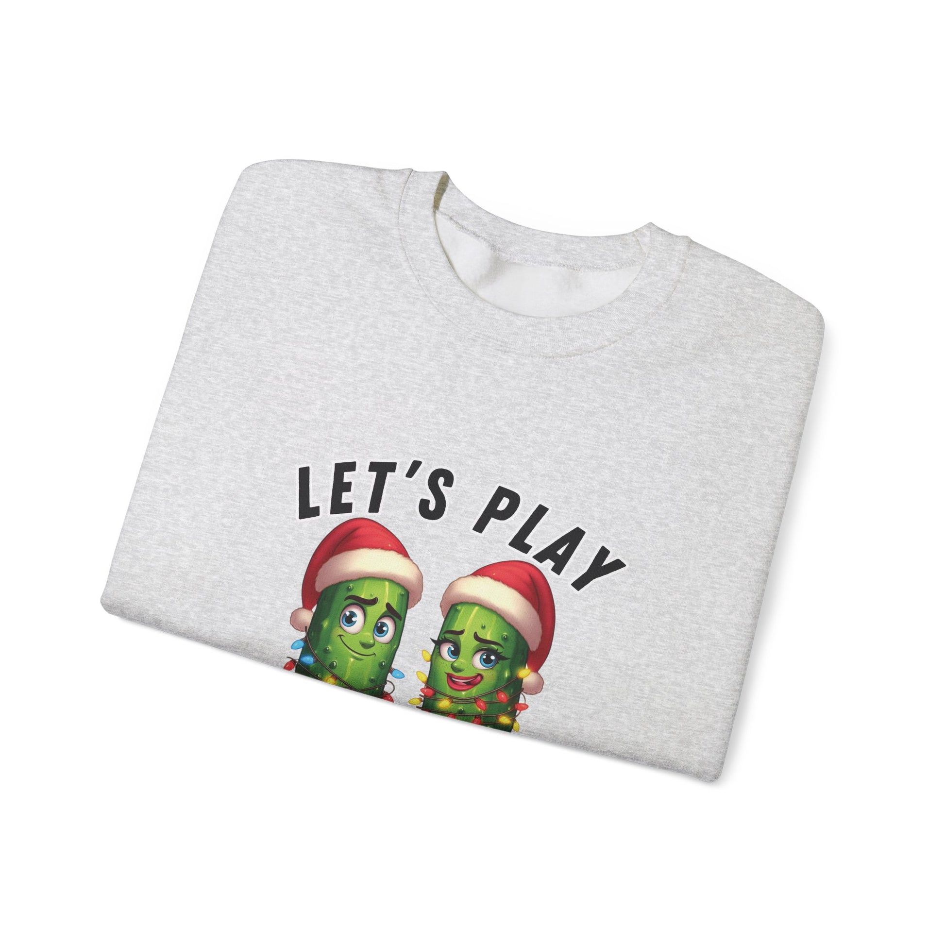 Folded gray sweatshirt with pickle characters and 'Let's Play' text on a white background