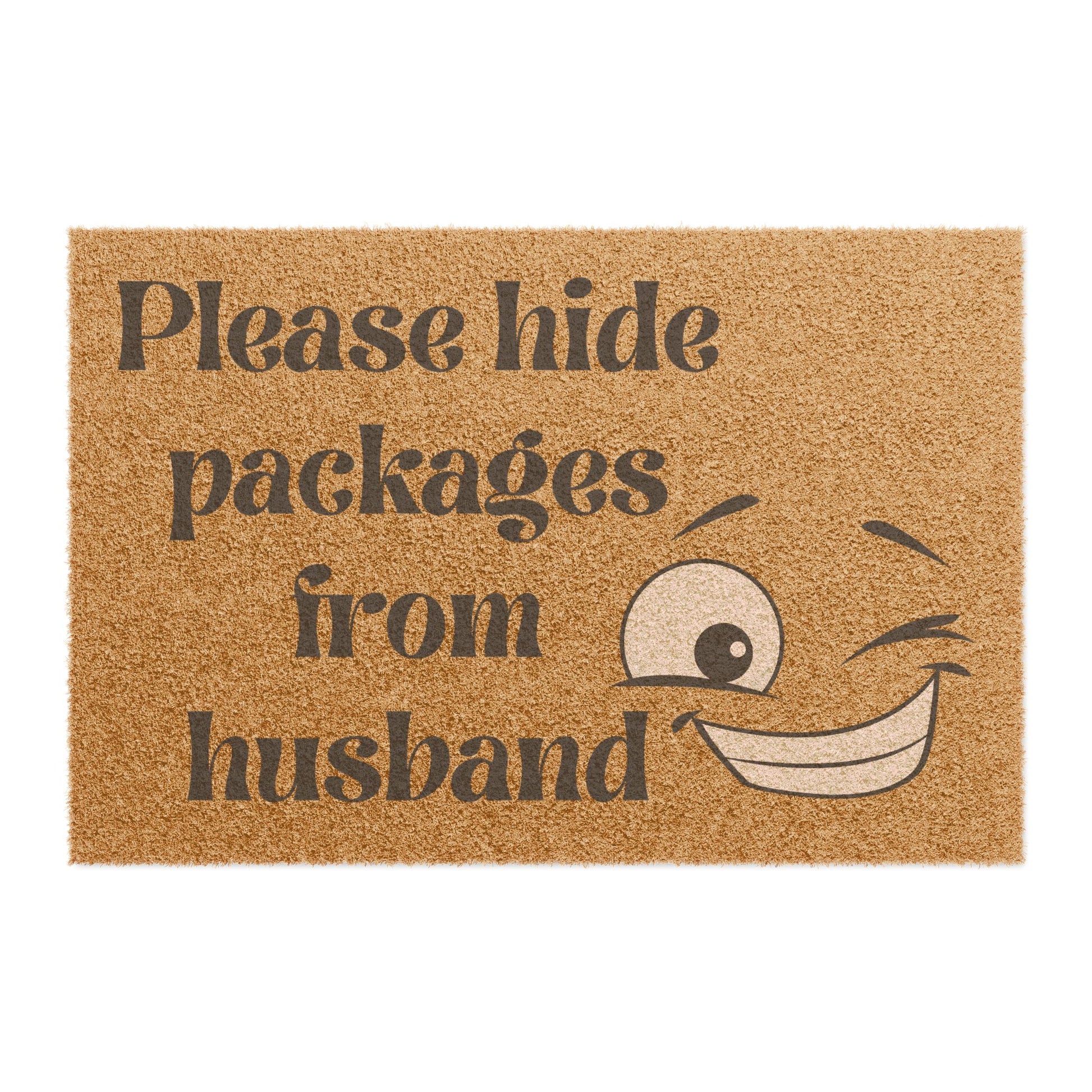 Doormat with text 'Please hide packages from husband' and a smiley face design.