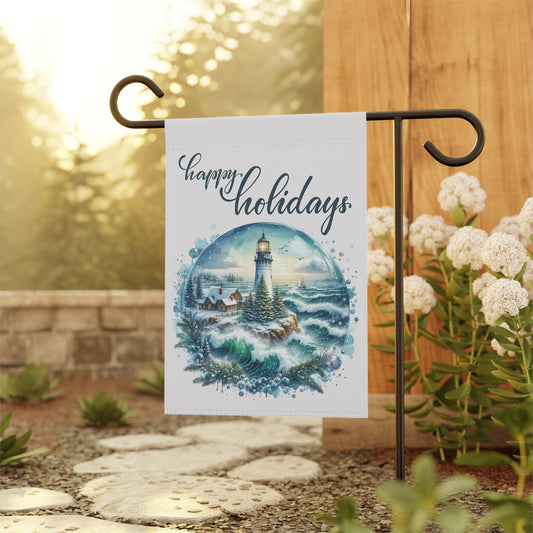 Decorative garden flag with lighthouse design and 'Happy Holidays' text, displayed outdoors.
