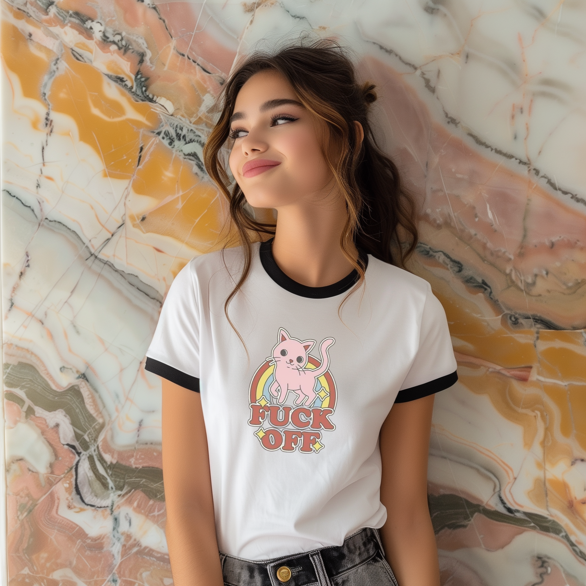 Person wearing a white t-shirt with a graphic design against a marble wall. kitty says f"ck off, retro design