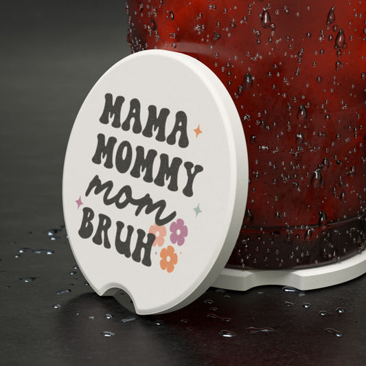 Coaster with 'Mama Mommy Mom Bruh' text on a dark surface
