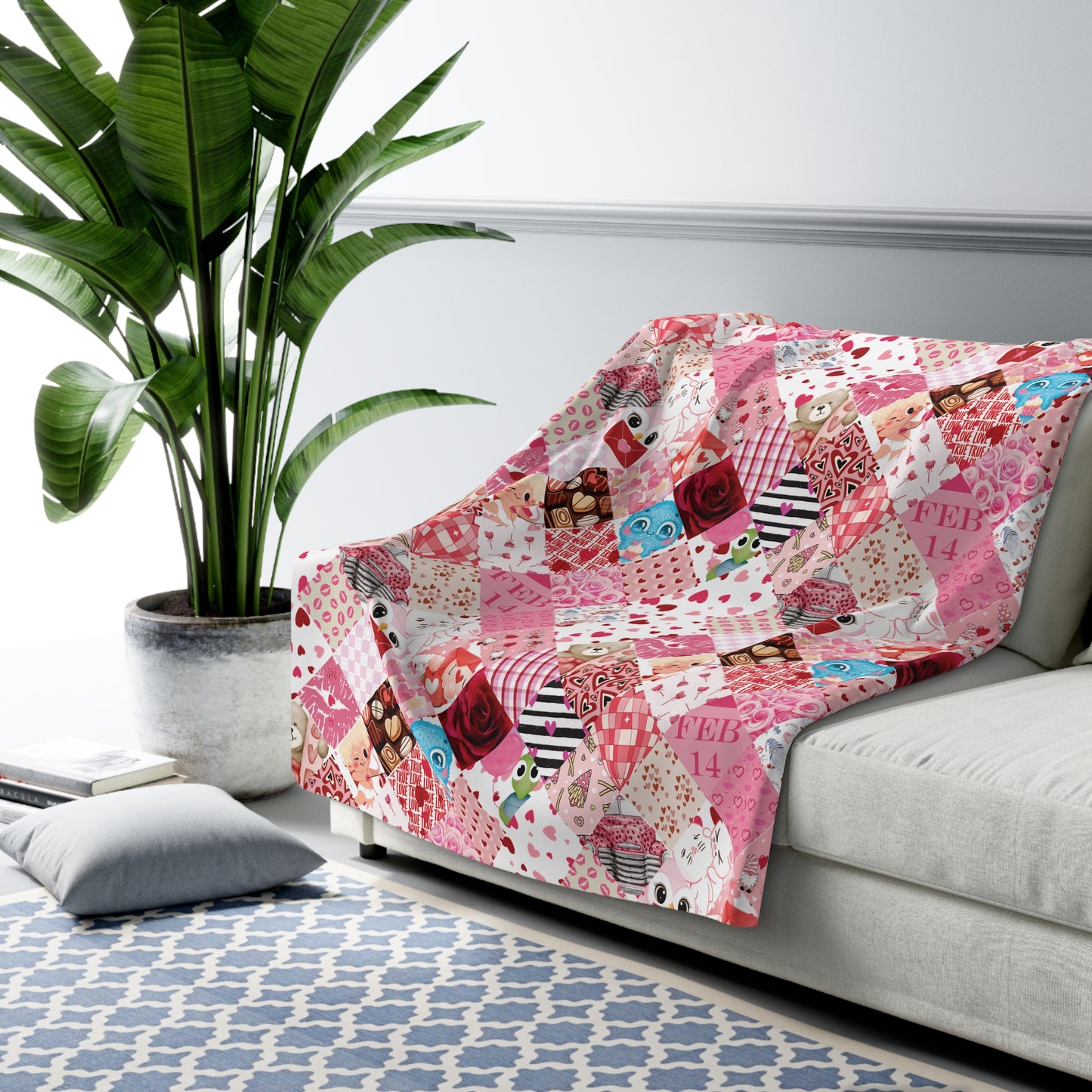 Patchwork blanket on a sofa with a plant and rug in the background, valentines day 