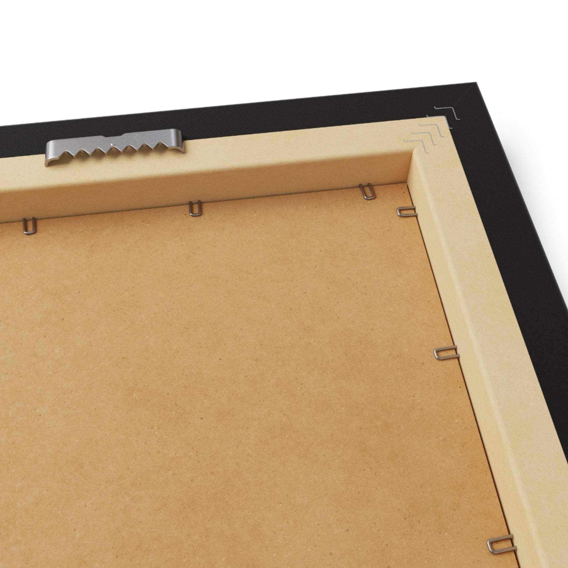 Close-up of a black picture frame with a cardboard backer and metal bracket.