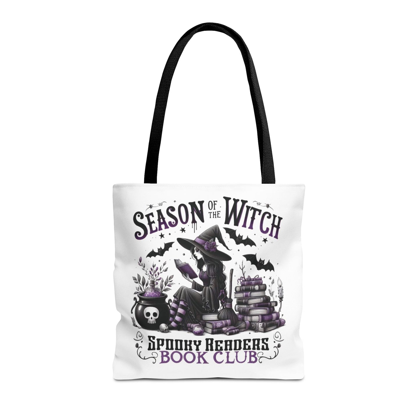 Tote bag with Halloween-themed design featuring a witch, books, and text on a white background. season of the witch spooky readers book club