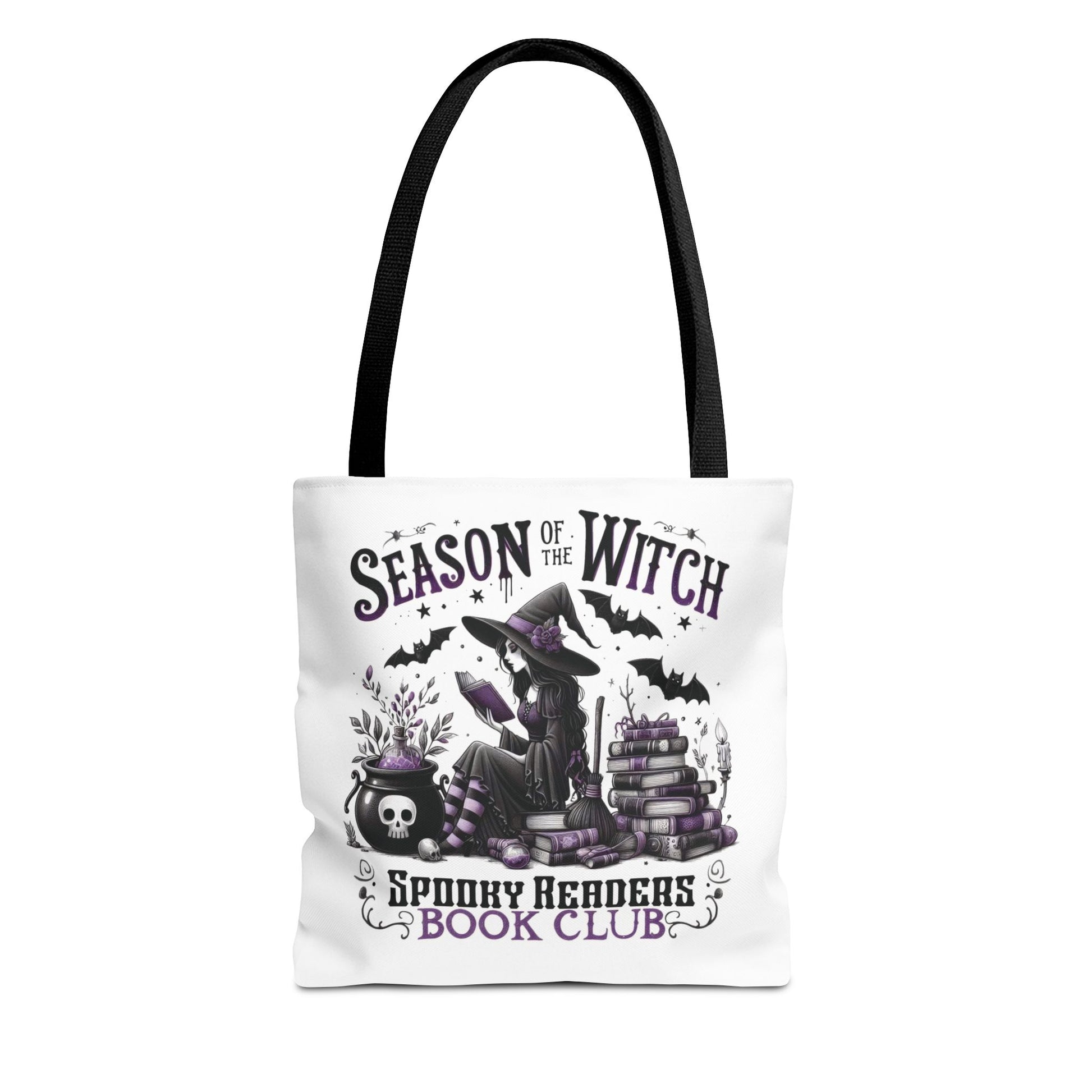 Tote bag with Halloween-themed design featuring a witch, books, and text on a white background. season of the witch spooky readers book club
