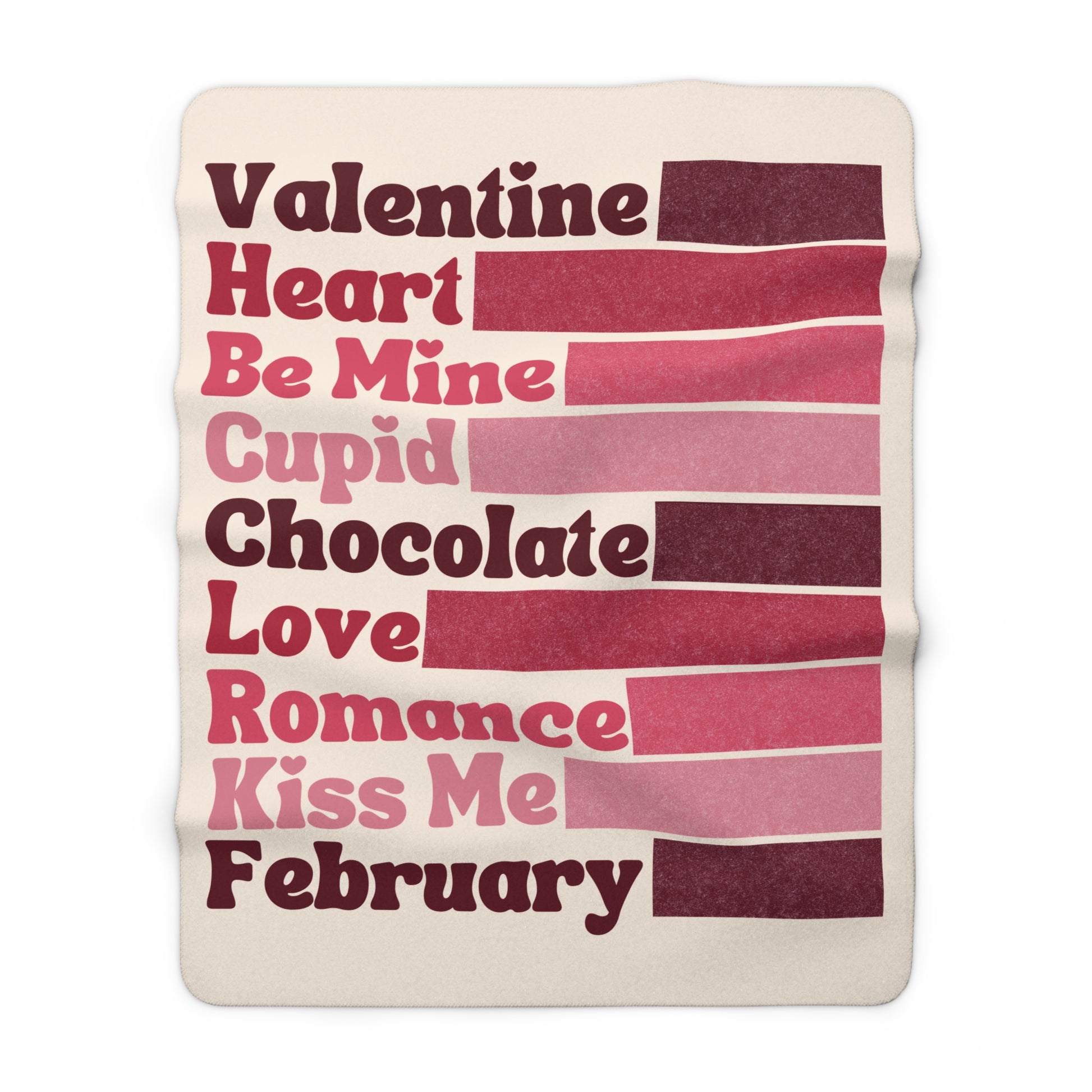 Blanket with Valentine-themed text in red and pink on a white background
